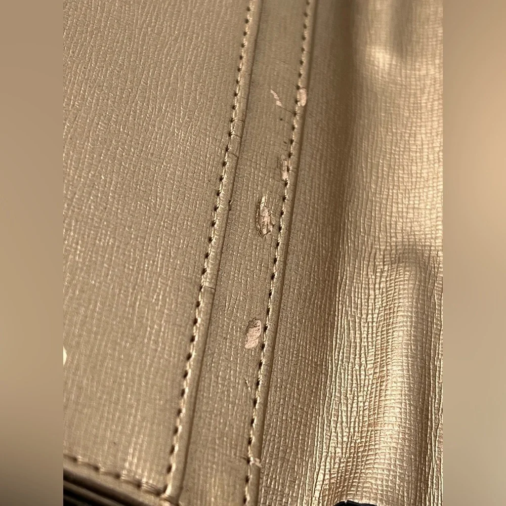 Aldo rose gold wallet with top bow